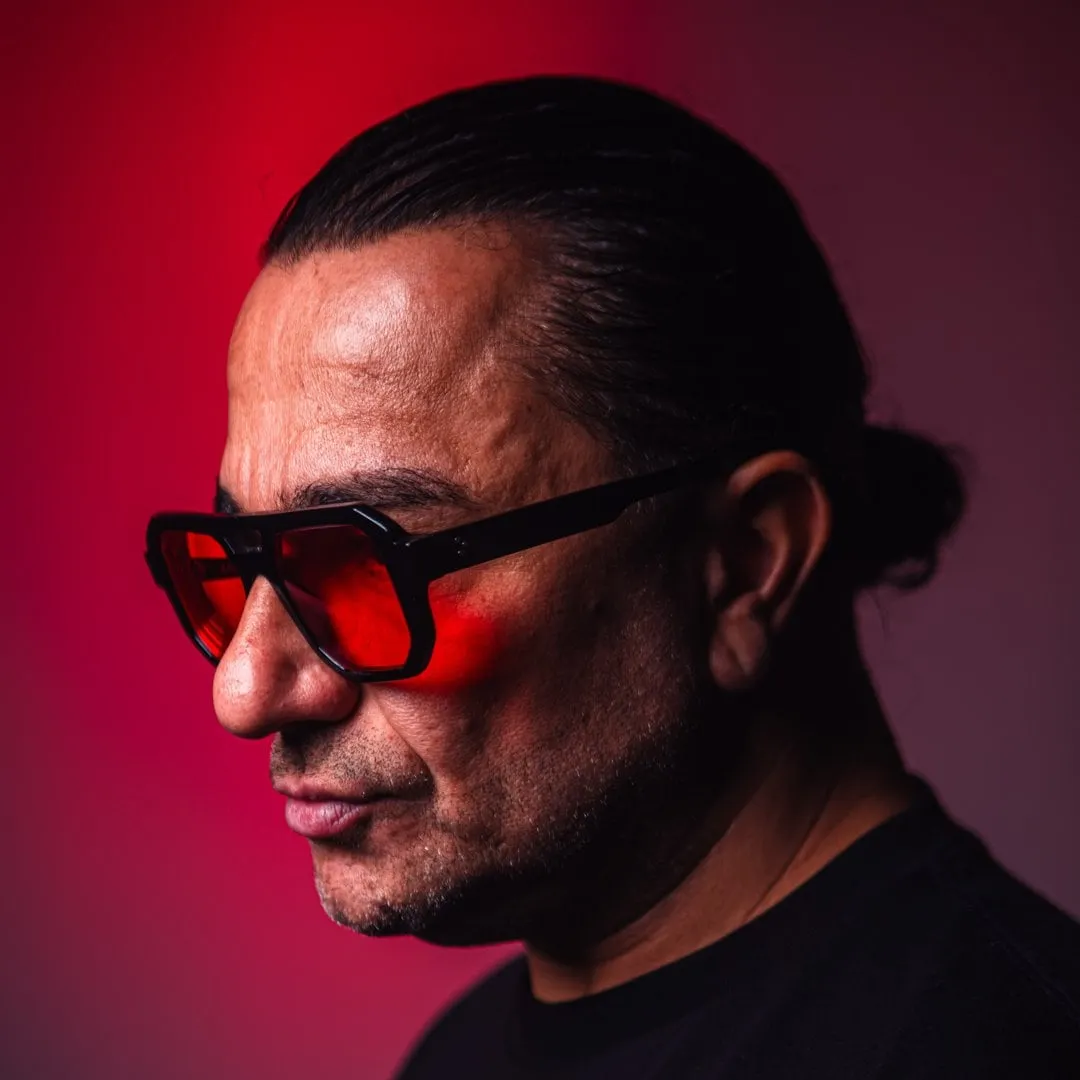 DJ Papa Smurf in red-tinted sunglasses