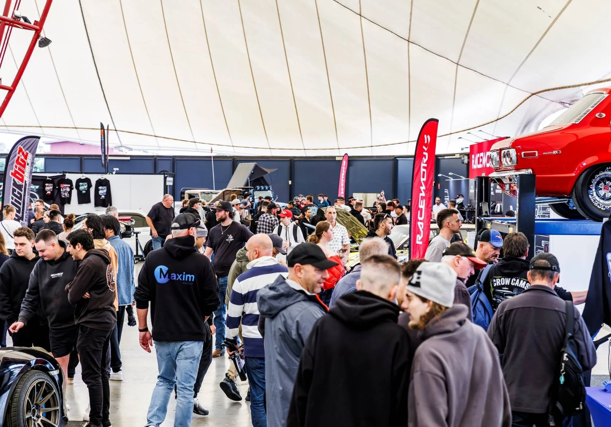 Crowds exploring the trade stands inside Performance World