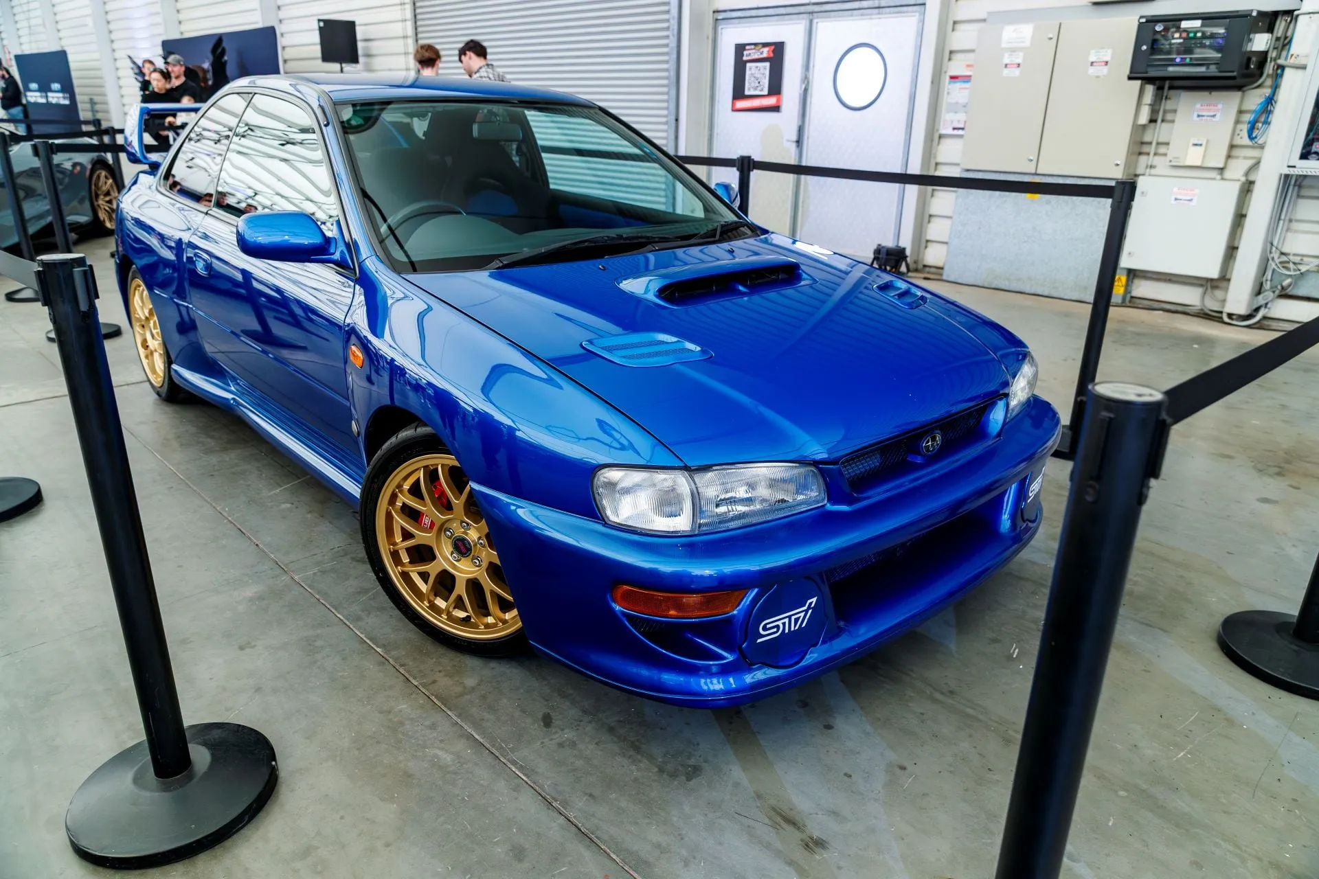 A blue Subaru WRX in Portelli World